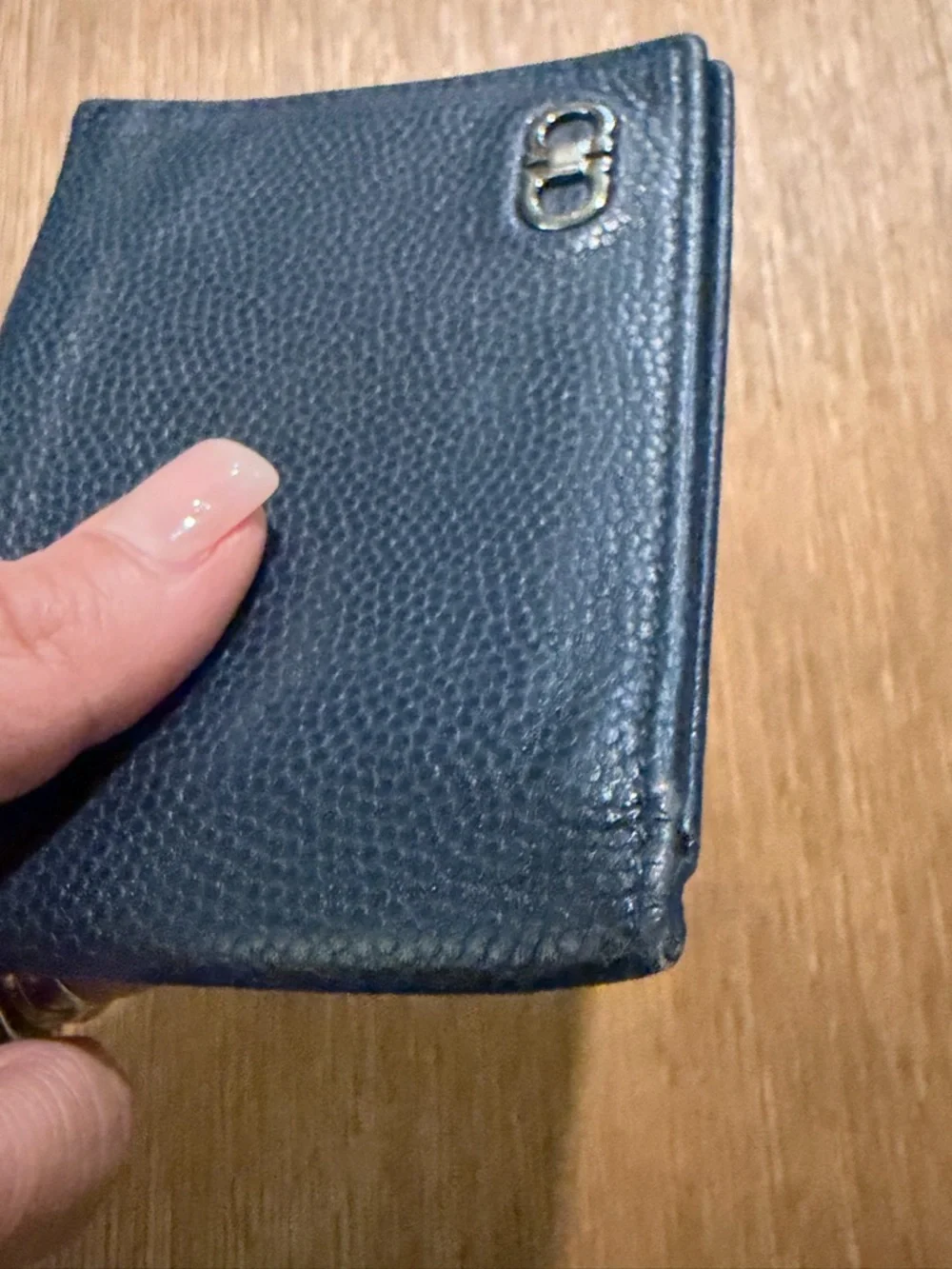 Salvatore Ferragamo men's textured leather bifold wallet with Gancini logo